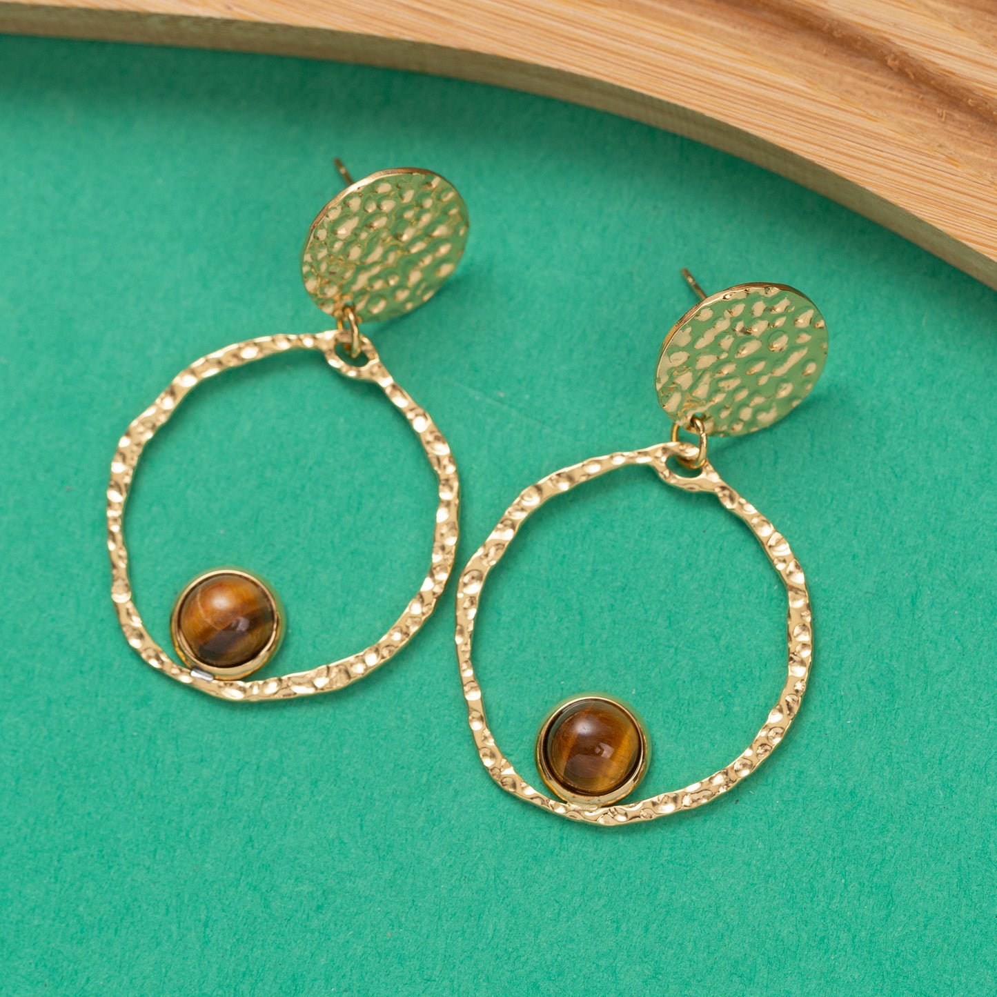 Boucles d'oreilles Pulse en acier inoxydable garanties