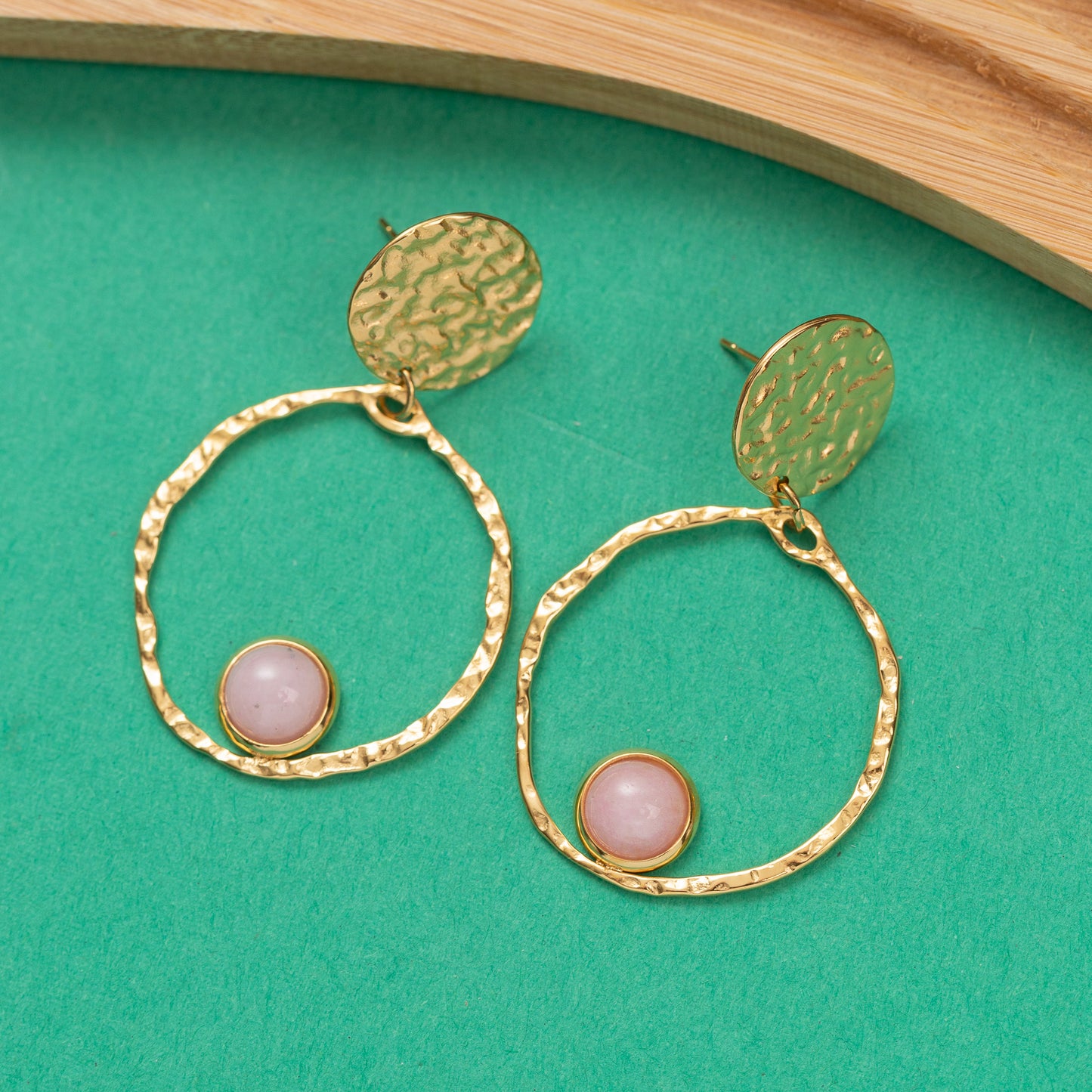 Boucles d'oreilles Pulse en acier inoxydable garanties