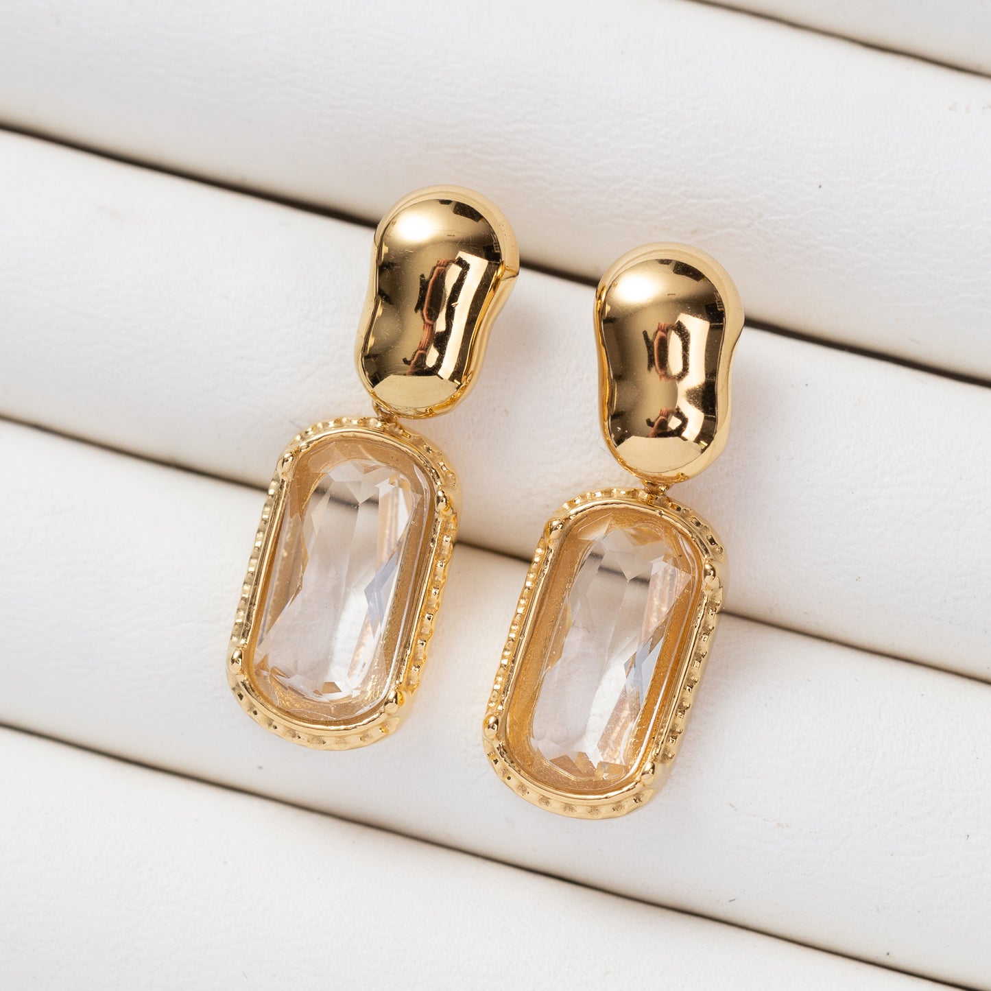 Boucles d'oreilles Essence en acier inoxydable garanties