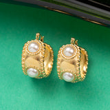 Boucles d'oreilles en acier inoxydable garanties