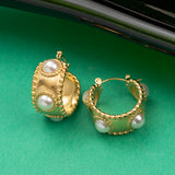Boucles d'oreilles en acier inoxydable garanties