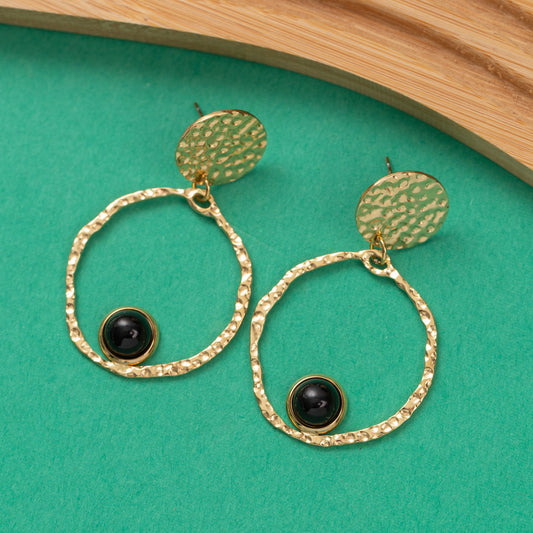 Boucles d'oreilles Pulse en acier inoxydable garanties