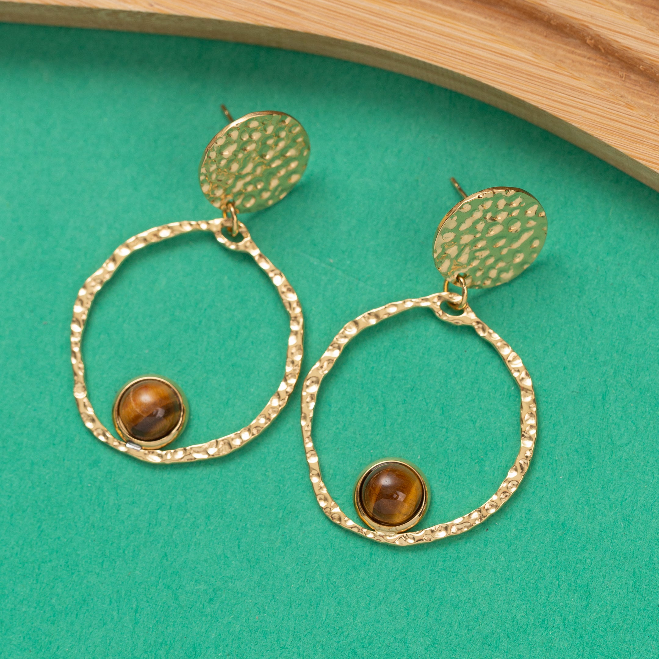 Boucles d'oreilles Pulse en acier inoxydable garanties