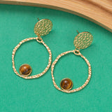 Boucles d'oreilles Pulse en acier inoxydable garanties