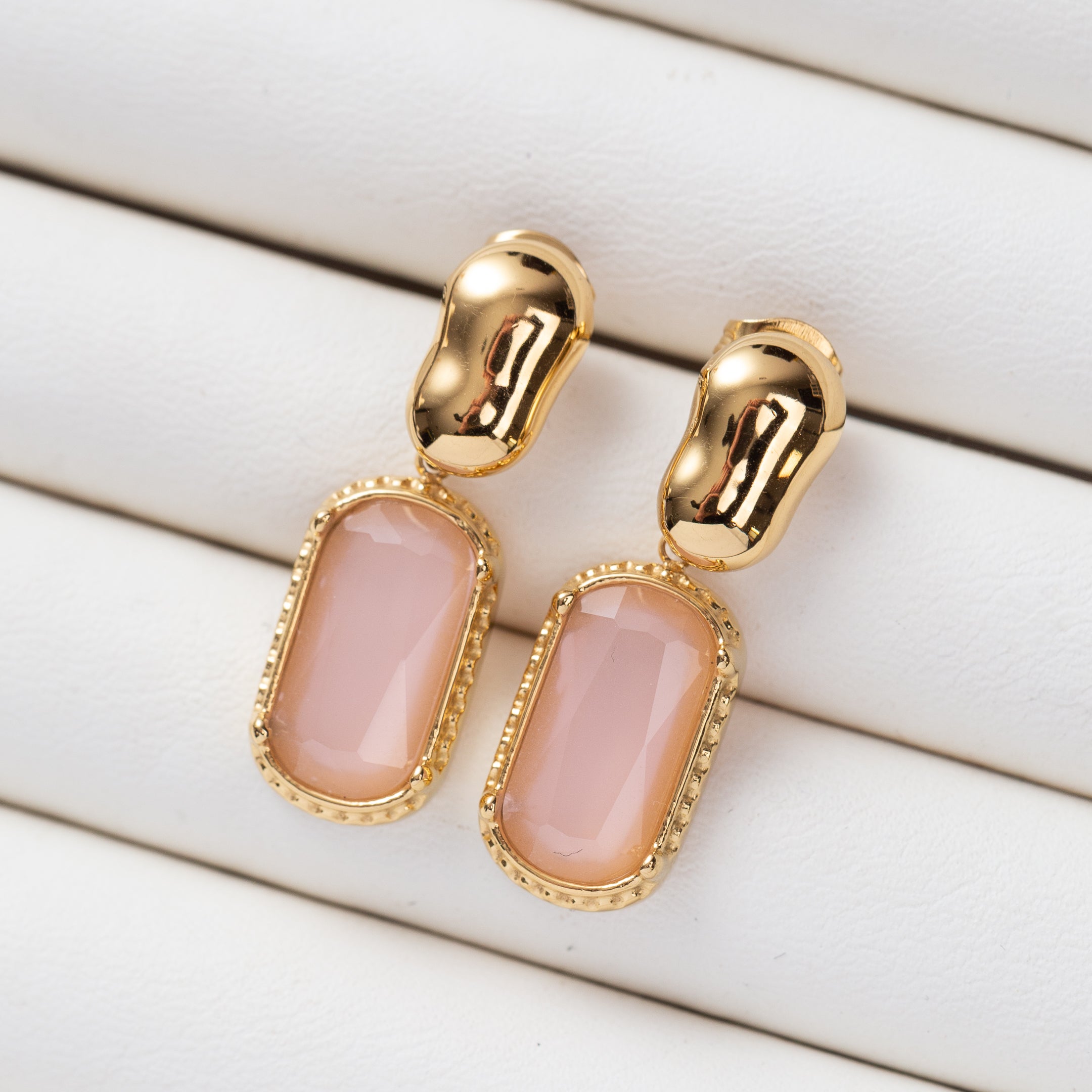 Boucles d'oreilles Essence en acier inoxydable garanties