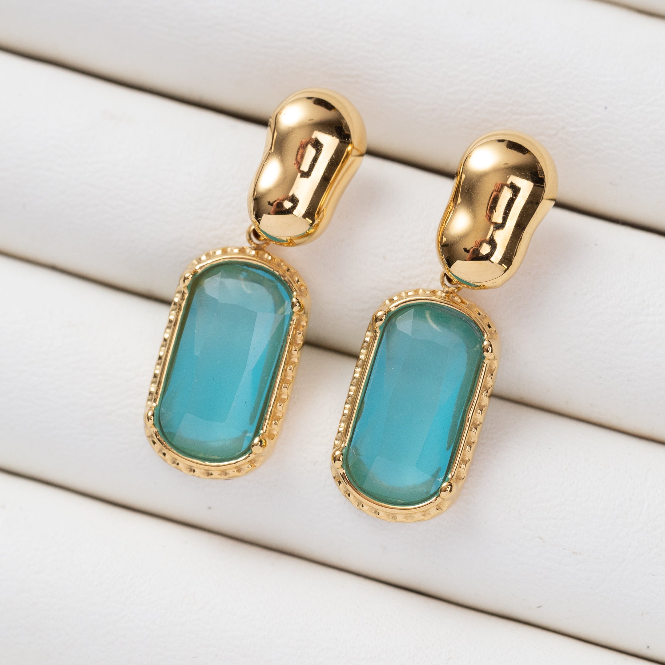 Boucles d'oreilles Essence en acier inoxydable garanties
