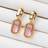 Boucles d'oreilles Essence en acier inoxydable garanties
