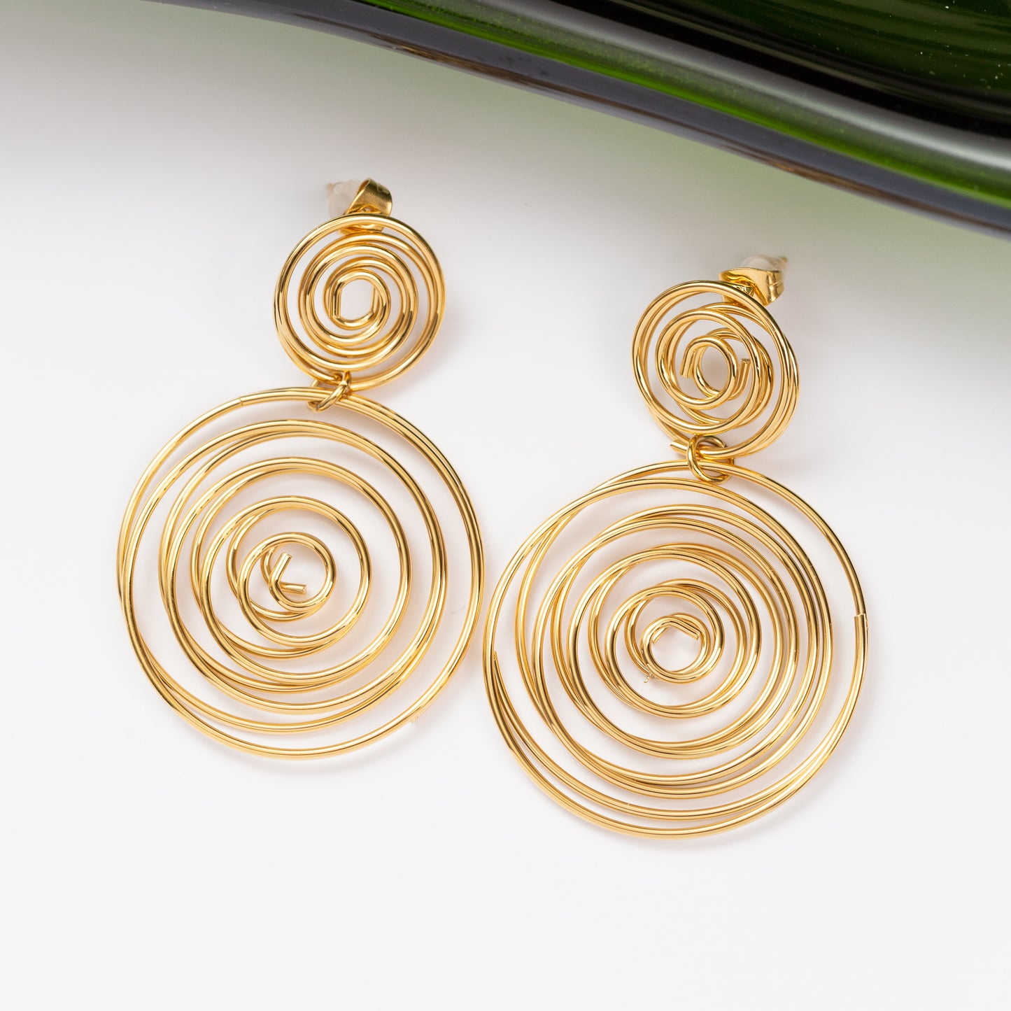 Boucles d'oreilles Pureté dorée en acier inoxydable garanties