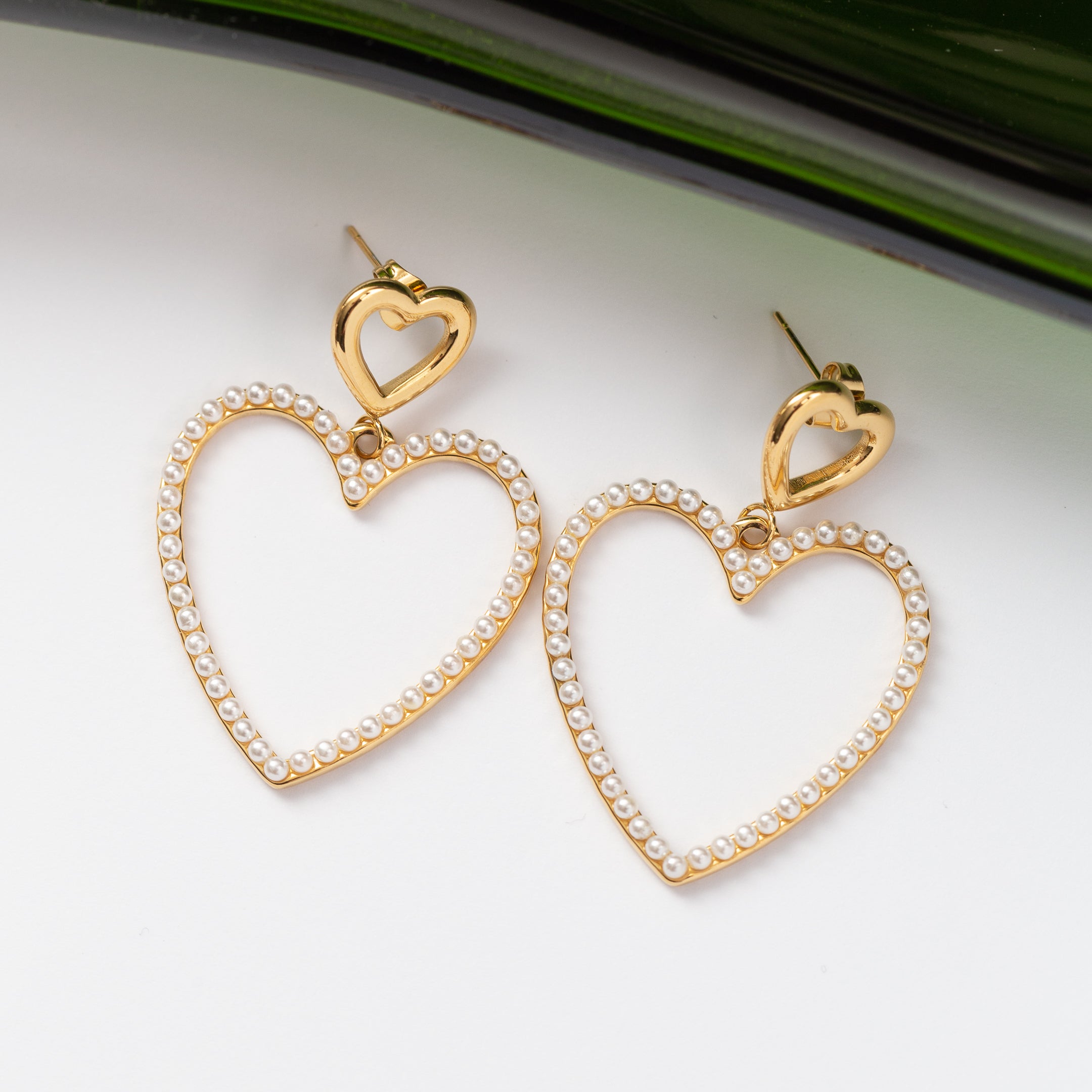 Boucles d'oreilles Pureté dorée en acier inoxydable garanties