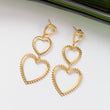 Boucles d'oreilles Pureté dorée en acier inoxydable garanties
