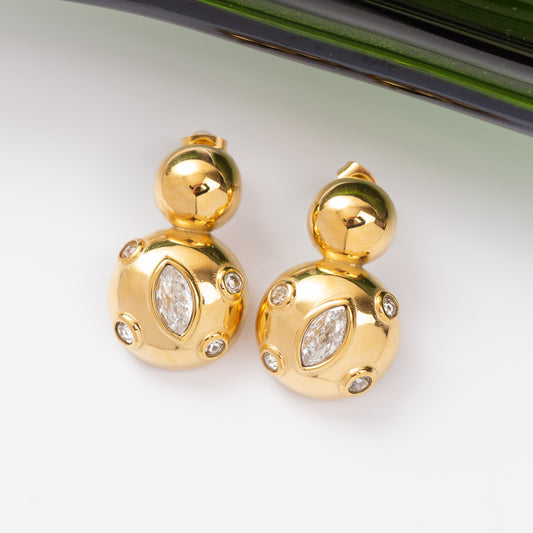 Boucles d'oreilles Pureté dorée en acier inoxydable garanties