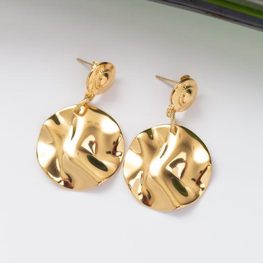 Boucles d'oreilles Pureté dorée en acier inoxydable garanties