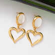 Boucles d'oreilles Pureté dorée en acier inoxydable garanties