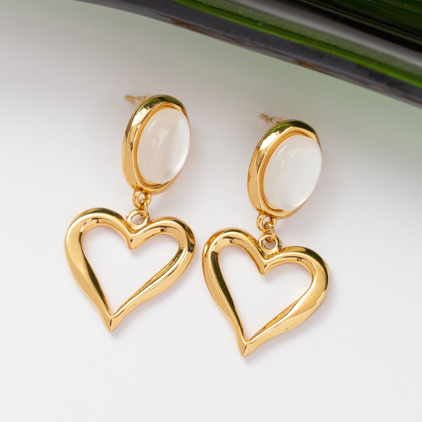 Boucles d'oreilles Pureté dorée en acier inoxydable garanties