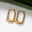 Boucles d'oreilles Pureté dorée 2 en acier inoxydable garanties