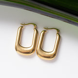 Boucles d'oreilles Pureté dorée 2 en acier inoxydable garanties