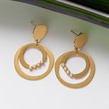 Boucles d'oreilles Pureté dorée 2 en acier inoxydable garanties