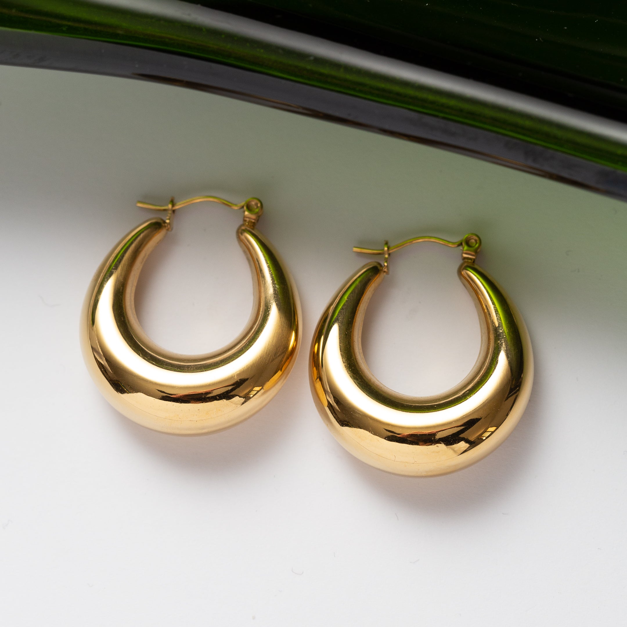 Boucles d'oreilles Pureté dorée 2 en acier inoxydable garanties