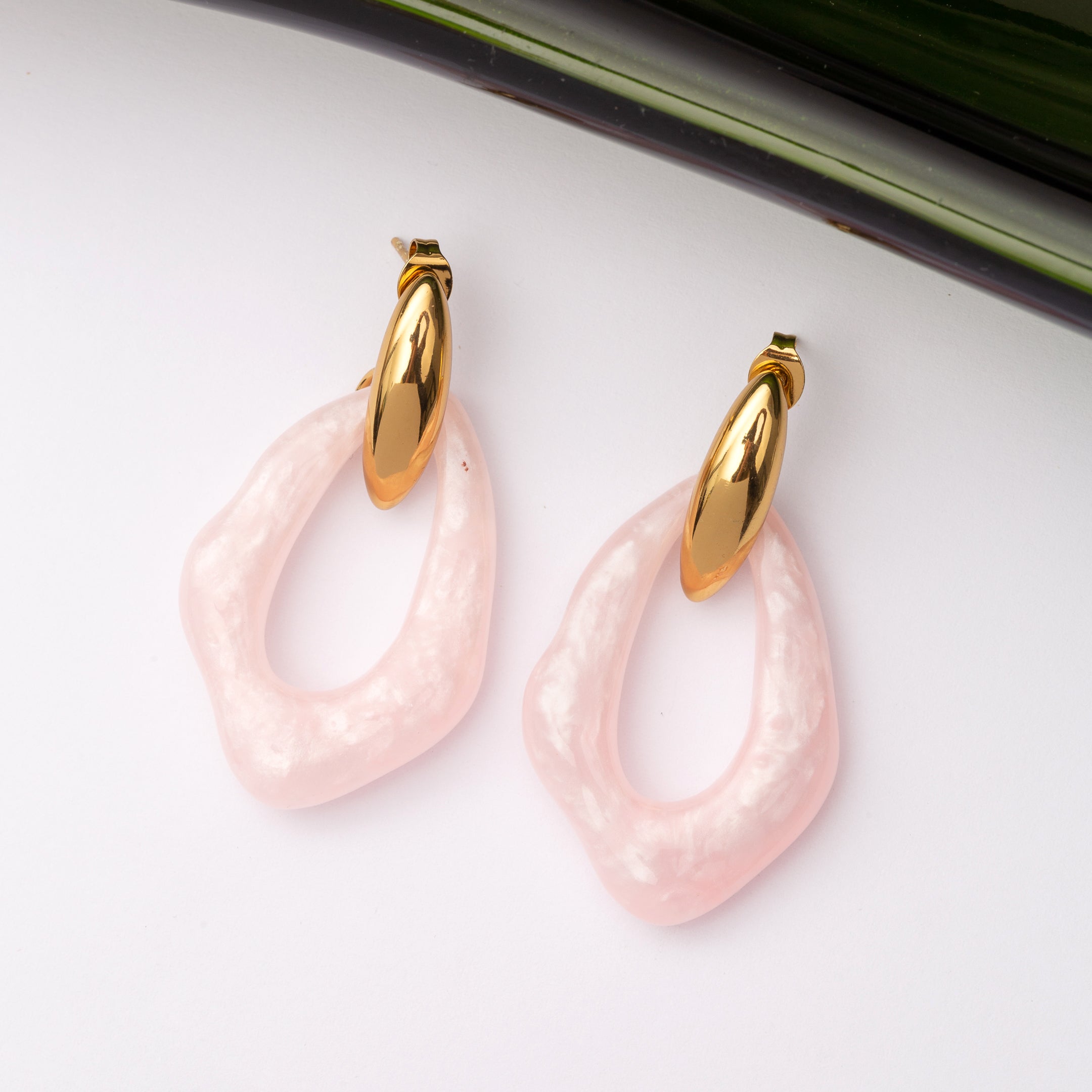 Boucles d'oreilles Monogramme en acier inoxydable garanties