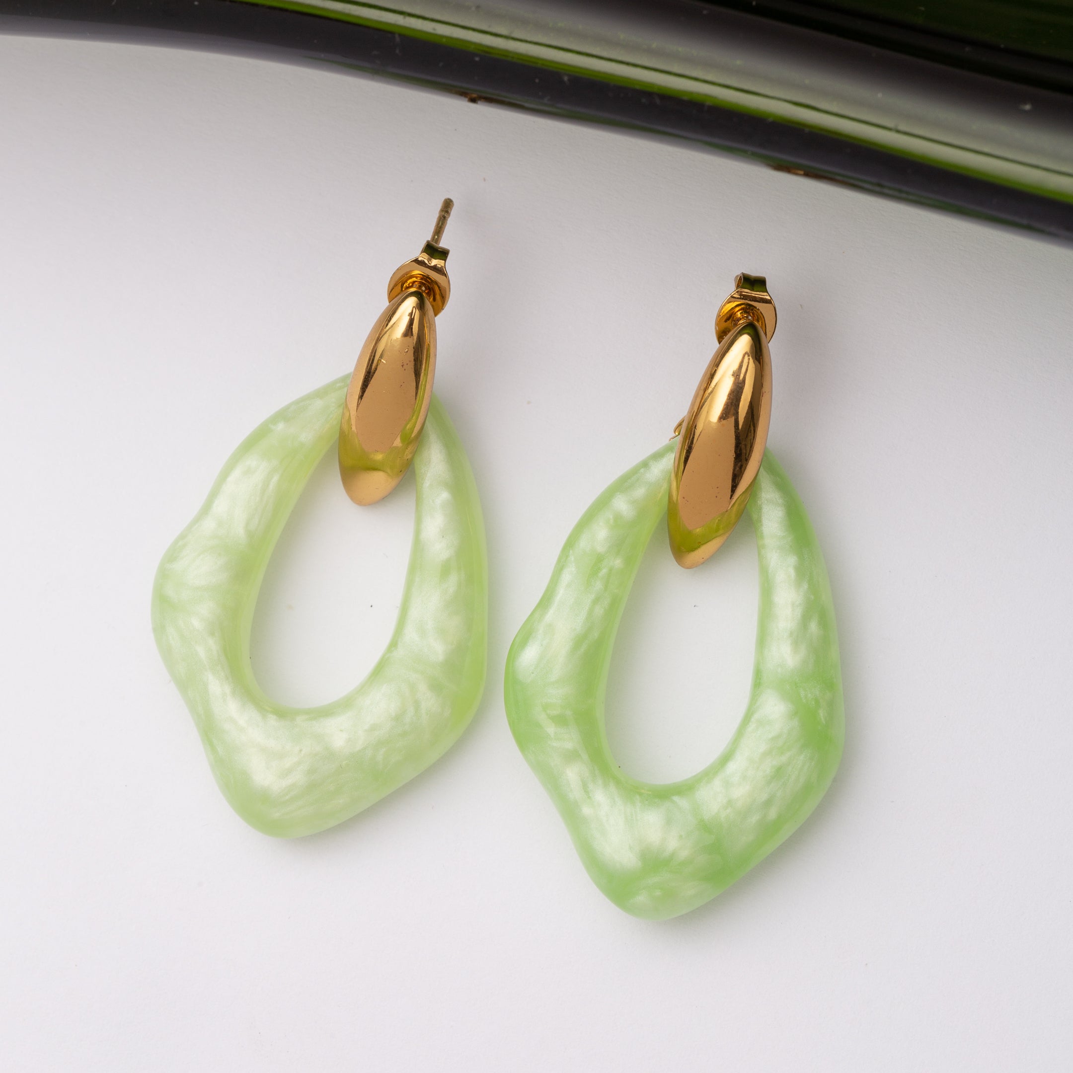Boucles d'oreilles Monogramme en acier inoxydable garanties