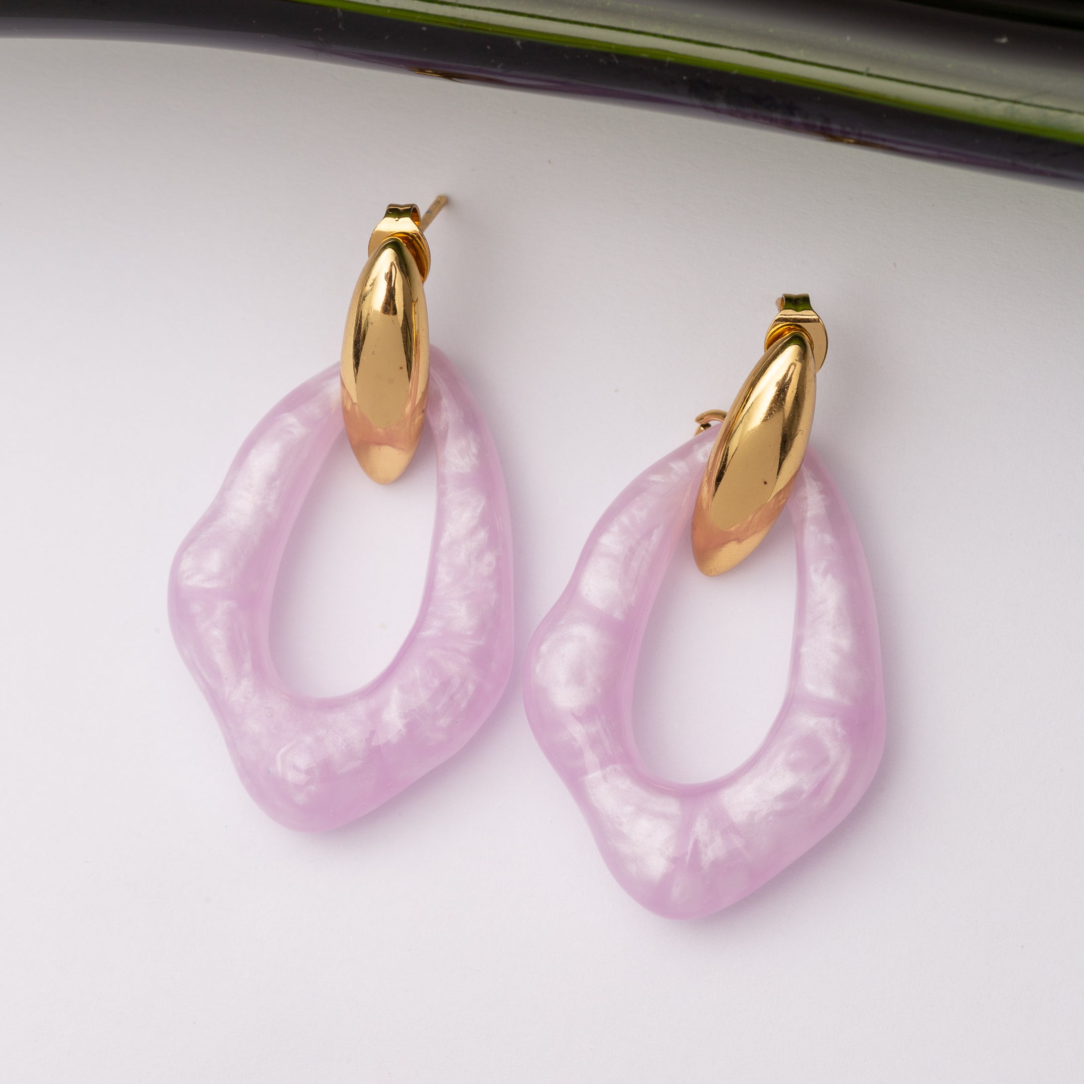 Boucles d'oreilles Monogramme en acier inoxydable garanties