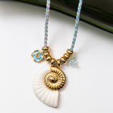 Collier en acier monté sur cordon