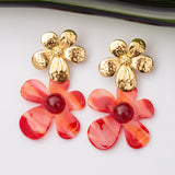 Boucles d'oreilles Flora en acier inoxydable garanties