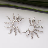 Boucles d'oreilles Flora en acier inoxydable garanties